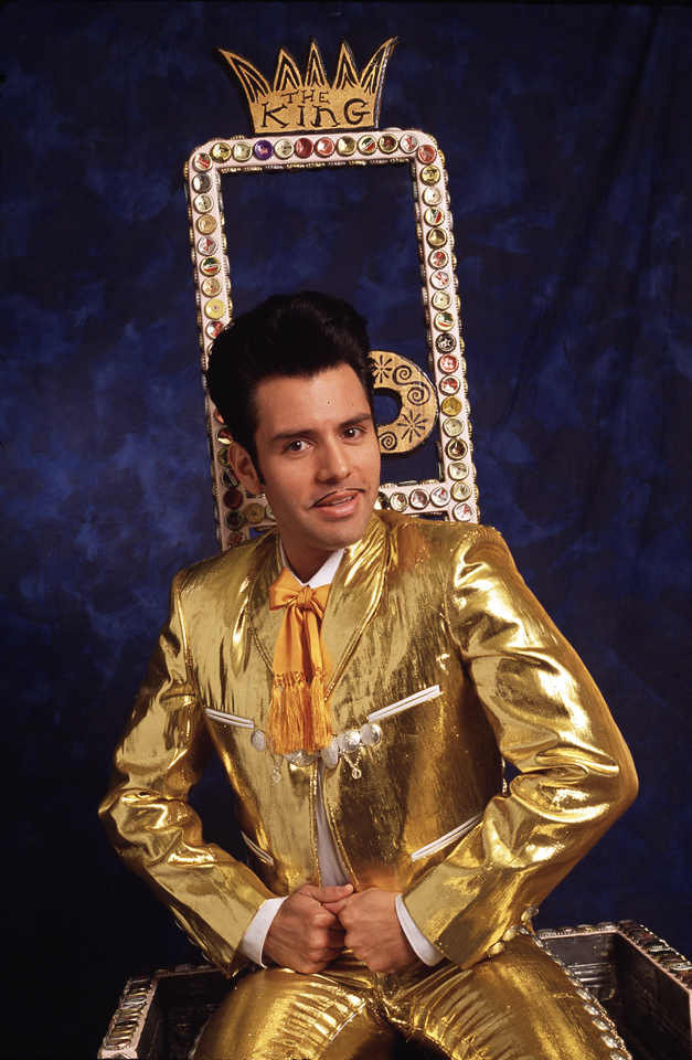 El Vez Gold suit in throne